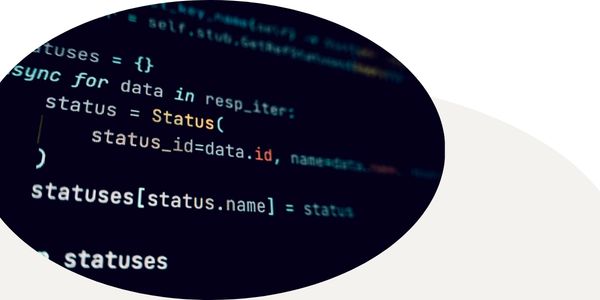 Python code in colored text on a black background in an oval frame with a white and tan background.